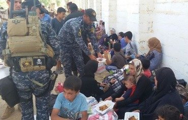 أهالي الفلوجة الناجون يتحدثون عن قمع داعش