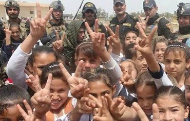 أهالي الرمادي يعودون إليها بعد هزيمة داعش