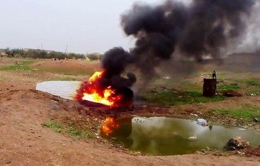خبراء: لا قيمة لـ ’الدينار الذهبي‘ لداعش