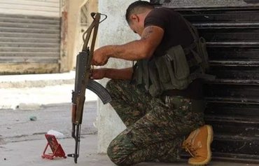 ناظران: مداخله ایران جنگ علیه داعش در سوریه را تضعیف می کند