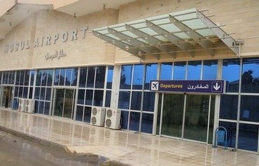 داعش تفخخ مطار الموصل مع اقتراب المعارك إليها