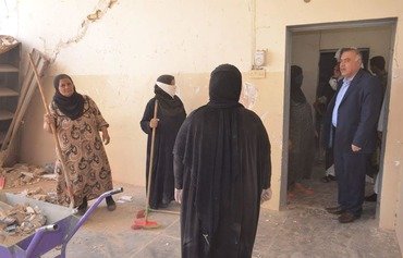 مدیر مدرسه در بازسازی مدارس جلولاء پیشگام شد