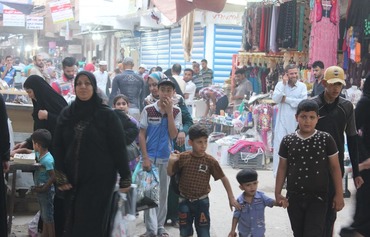 در عکس ها: زندگی در رمادی به حال عادی بازمی گردد