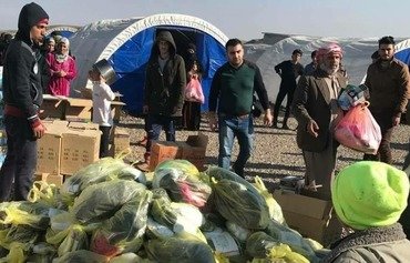 یک شبکه نینوا برای آوارگان داخلی موصل نان جمع آوری می کند