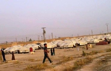 أهالي دير الزور عالقون في اشتباكات الحرب القائمة
