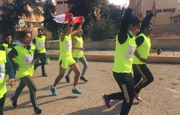 دوندگان جوان در خیابان های موصل برای صلح می دوند