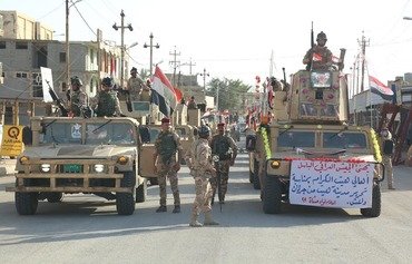 هيت تحتفل بذكرى تحريرها من داعش بعرض عسكري