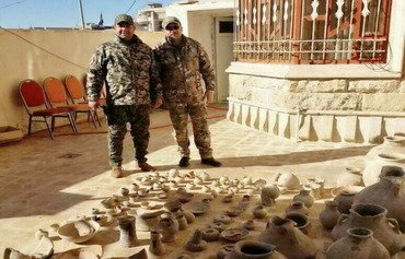 العثور على قطع أثرية مسروقة في منزل مهجور بالموصل