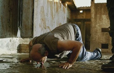 معتقلون سابقون يؤكدون الادعاءات المتعلقة بمحرقة صيدنايا