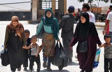 اندونيسيون يشجبون ʼأكاذيبʻ داعش بعد فرارهم من الرقة السورية
