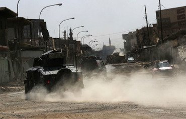 القوات العراقية تلاحق الفارين من عناصر داعش في جنوب الموصل