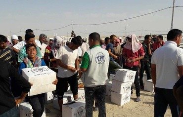 خانواده های انبار برای گریز از داعش زندگی خودشان را به خطر می اندازند