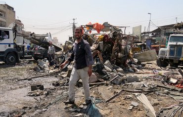 مقتل 11 في انفجار سيارة مفخخة في سوق ببغداد
