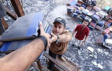 کتاب های اهدایی کتابخانه دانشگاه موصل را احیاء می کند