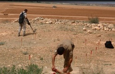 مجلس الرقة المدني يزيل الألغام من المناطق المحررة