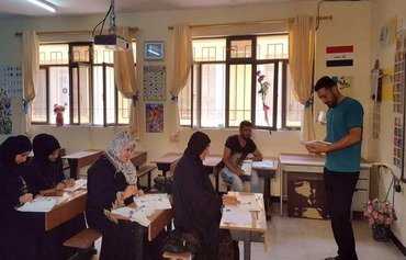 العراق يستأنف جهود محو الأميّة في المدن المحرّرة