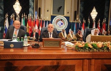 تعهدات بـ٣٠ مليار دولار لإعادة اعمار العراق