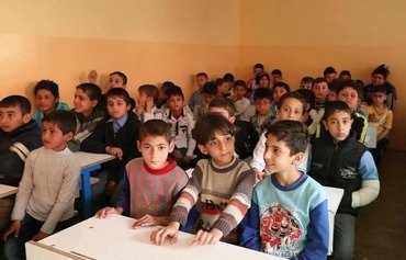 العراق يعمل على تأهيل الطلاب في المدن المحررة