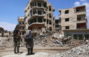 المعارضة السورية تنسحب من الغوطة مع مغادرة أحد زعمائها الكبار من الجيب