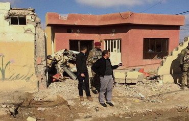 أصحاب المنازل المدمرة بالفلوجة  يحصلون على تعويضات