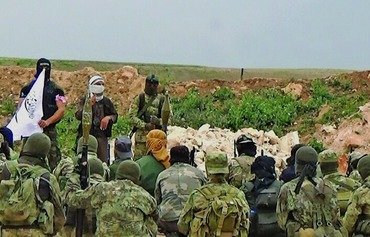 مع تصاعد التوترات، المتشددون يتحالفون في إدلب