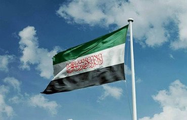 علم هيئة تحرير الشام الجديد يلاقى بالرفض