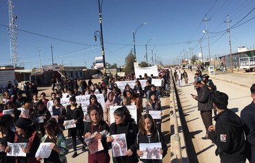 العراق يدعو للتحقيق في مقبرة جماعية بسوريا