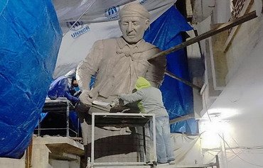 نحاتون من الموصل يعملون على إحياء معالم المدينة