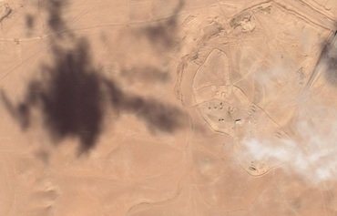 الحرس الثوري الإيراني يبني قاعدة جديدة على الحدود العراقية السورية