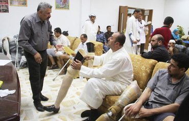 العراق يدشن برنامجًا لمساعدة ضحايا ألغام داعش