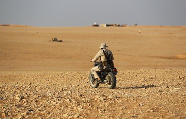 مقتل 8 مقاتلين عراقيين في غارة جوية شرق سوريا