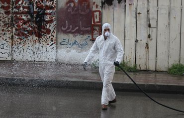 إغلاق تام في العراق وأول حالة لفيروس كوفيد 19 في سوريا