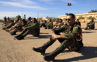ʼجيش الظلʻ التابع لموسكو يجند الشباب السوري للقتال في ليبيا