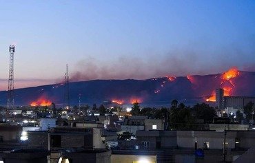 فلول داعش يضرمون النار في أراض زراعية بنينوى
