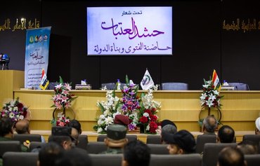 السيستاني يدعم انخراط الحشد الشعبي بصفوف قوات الأمن في خطوة تعكس حذره من النفوذ الإيراني