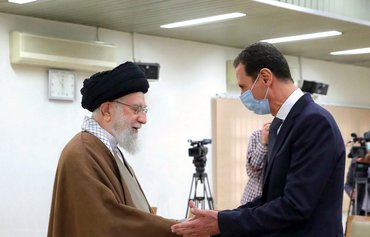 خامنئي يشيد بالأسد في ظل ظهور جرائم حرب جديدة